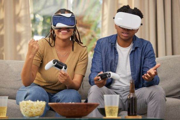 Man, woman and virtual reality video game and challenge, competition winner and futuristic gaming d